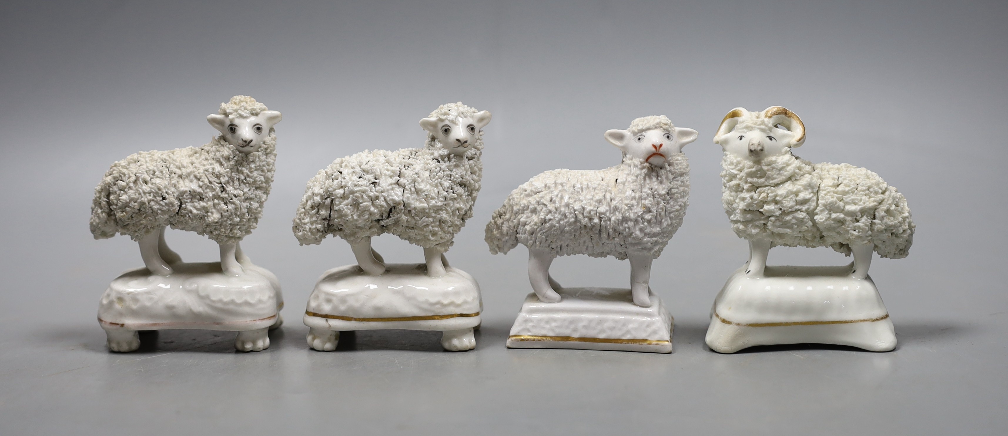Four Staffordshire porcelain models of sheep, c.1830–50, the largest 7.5 cm long, Provenance- Dennis G Rice collection
